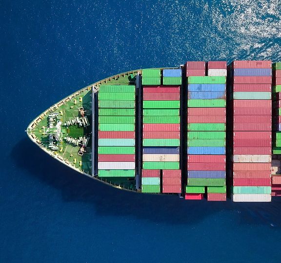 Aerial view of freight ship with containers